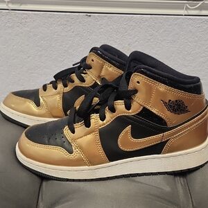 Air Jordan Black and Gold Sneakers